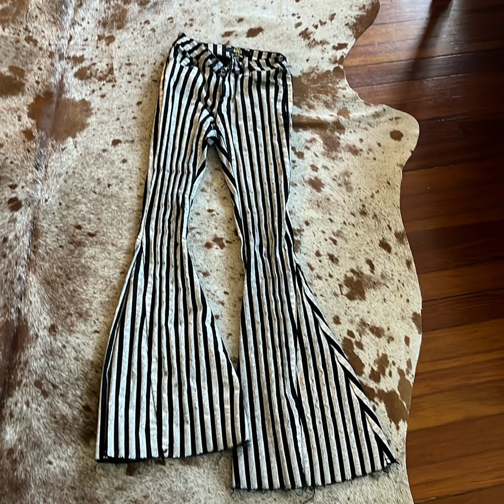 Selling a pair of black and white L&B mid-rise flares